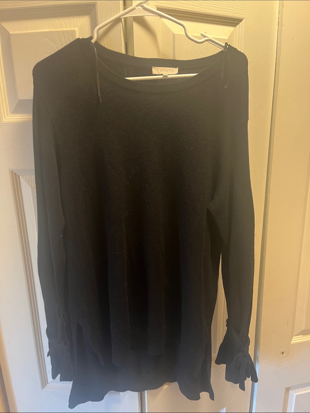 1. State Black Knit Long-Sleeve Top with Tie Cuffs